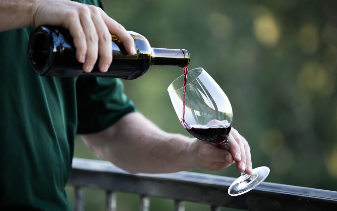 Lecavalier - pouring wine into glass